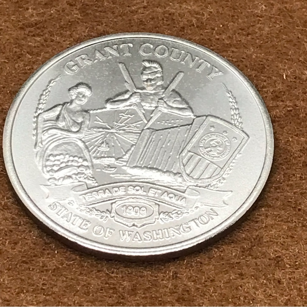 Grant County token from Washington centennial 1989.